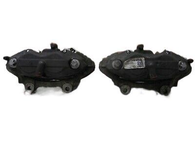 Dodge 68144243AA CALIPER ASSEMBLY Disc Brake Front Includes Pistons and Seal Boots